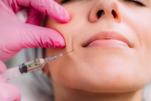 A woman getting dermal fillers in Bayside
