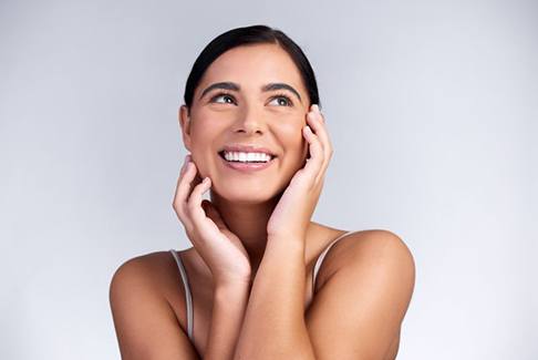 Portrait of a smiling woman with beautiful skin