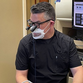 Doctor Young treating a dental patient