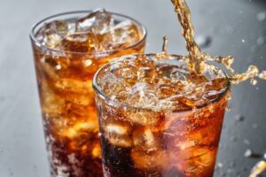 Two glasses of soda. 