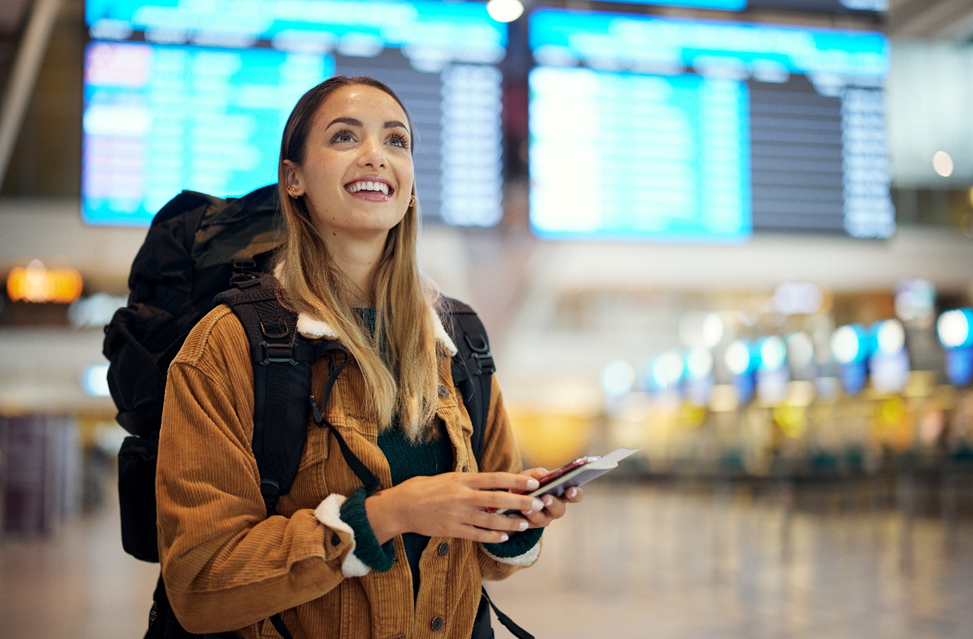 smiling young woman in airport